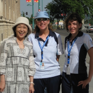 Volunteer staff at expo saying 'Hello' in Japanese in the old town area of Zaragoza