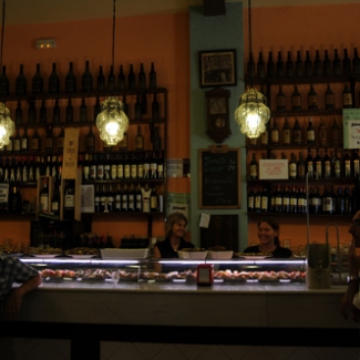 The shelves are sagging under the weight of wine in the bar!