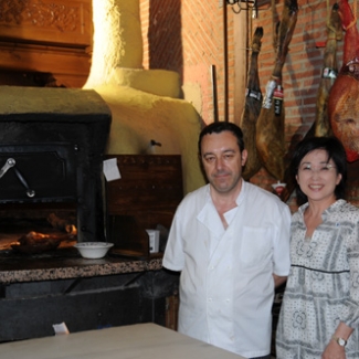 With chef in front of the oven